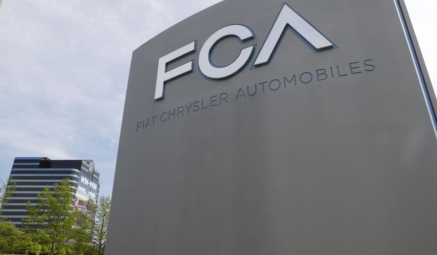FILE - In this May 27, 2019, file photo, the Fiat Chrysler Automobiles world headquarters is shown in Auburn Hills, Mich. Shareholders of Fiat Chrysler and France&#39;s PSA Group are meeting Monday, Jan. 4, 2021 to vote on a merger that will create the world&#39;s fourth-largest automaker. The new company called Stellantis will be run by PSA CEO Carlos Tavares, who is known for cutting vehicles or ventures that don&#39;t make money. (AP Photo/Paul Sancya, File)
