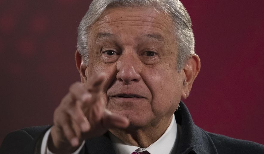 Mexican President Andres Manuel Lopez Obrador gives his regularly scheduled morning press conference known as &amp;quot;La Mañanera&amp;quot; at the National Palace in Mexico City, Friday, Dec. 18, 2020. Las Mañaneras are a platform for the president to relay information he says the media ignore or misrepresent. (AP Photo/Marco Ugarte)