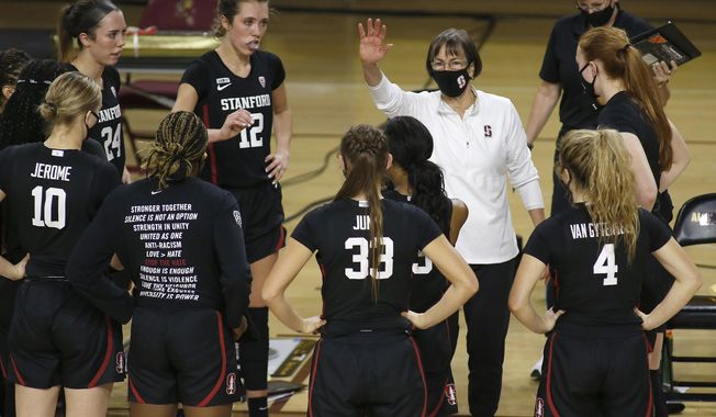 Stanford head coach Tara Vanderveer talks to her team as they play Arizona State during the second half of an NCAA college basketball game Sunday, Jan 3, 2021, in Tempe, Ariz. (AP Photo/Darryl Webb)