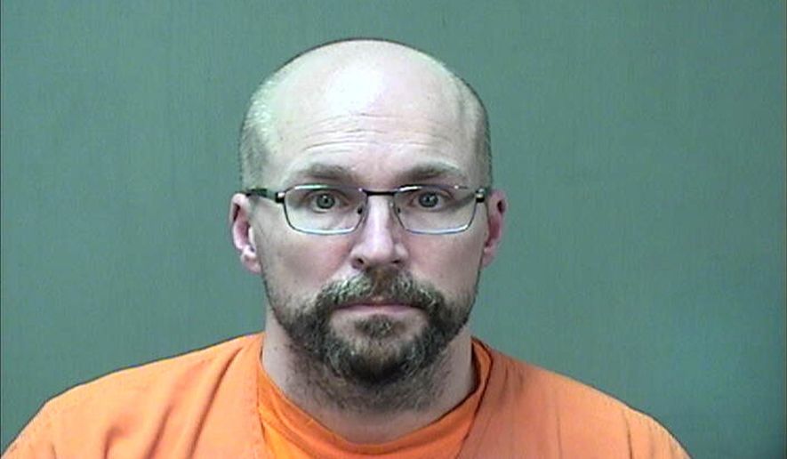 In this booking photo provided by the Ozaukee County Sheriff&#39;s Office Monday, Jan. 4, 2021 in Port Washington, Wis. Steven Brandenburg is shown. The Wisconsin pharmacist, accused of intentionally spoiling hundreds of doses of coronavirus vaccine, convinced the world was &amp;quot;crashing down&amp;quot; told police he tried to ruin hundreds of doses of coronavirus vaccine because he felt the shots would mutate people&#39;s DNA, according to court documents released Monday. (Ozaukee County Sheriff via AP)