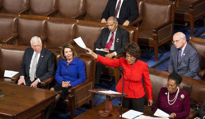In this file photo, Rep. Maxine Waters, D-Calif., objects during a joint session of Congress to count electoral votes in Washington, Friday, Jan. 6, 2017. (AP Photo/Zach Gibson)  **FILE**