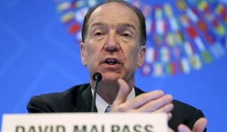 FILE - In this Oct. 17, 2019 file photo, World Bank President David Malpass speaks during a news conference at the World Bank/IMF Annual Meetings in Washington.  The World Bank on Tuesday, Jan. 5, 2021 forecast that the global economy will see a subdued recovery this year from a devastating pandemic but warned that the near-term outlook is highly uncertain and growth could be harmed if infections keep rising and the rollout of vaccines is delayed.(AP Photo/Jose Luis Magana, File)