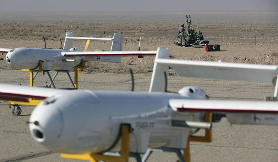 In this undated photo released on Monday, Jan. 4, 2021, by Iranian Army, drones are displayed ahead of a drill, Iran. (Iranian Army via AP)