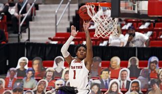 Texas Tech&#39;s Terrence Shannon Jr. (1) shoots the ball during the first half of an NCAA college basketball game against Kansas State, Tuesday, Jan. 5, 2021, in Lubbock, Texas. (AP Photo/Brad Tollefson)