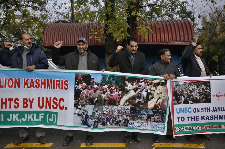 Supporters of the civil society group, Jammu Kashmir Forum, take part in a demonstration to mark, The Right to Self-determination Day,&amp;quot; in Islamabad, Pakistan, Tuesday, Jan. 5, 2020. Dozens of Kashmiris activists living Pakistan rallied in the capital, Islamabad, urging the United Nations to ensure the provision of right of self-determination to them as per its decades-old resolution on Kashmir. (AP Photo/Anjum Naveed)