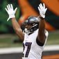 Baltimore Ravens running back J.K. Dobbins (27) celebrates after scoring a touchdown against the Cincinnati Bengals during the second half of an NFL football game, Sunday, Jan. 3, 2021, in Cincinnati. (AP Photo/Aaron Doster) **FILE**