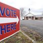 A sign at the street points voters to a polling place at Dawnville United Methodist Church in Dawnville, Ga., on Tuesday, Jan. 5, 2021. (Matt Hamilton/Chattanooga Times Free Press via AP)