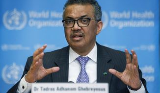 FILE - In this Monday, March 9, 2020 file photo, Tedros Adhanom Ghebreyesus, Director General of the World Health Organization speaks during a news conference, at the WHO headquarters in Geneva, Switzerland. Ghebreyesus says that he is “disappointed” that Chinese officials haven&#39;t finalized permissions for the arrival of a team of experts into China to examine origins of COVID-19. In a rare critique of Beijing, he said on Tuesday, Jan. 5, 2021 members of the international scientific team have begun over the last 24 hours to leave from their home countries to China as part of an arrangement between WHO and the Chinese government. (Salvatore Di Nolfi/Keystone via AP, file)
