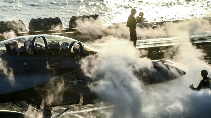 ARABIAN GULF (Dec. 21, 2017) An F/A-18F Super Hornet, assigned to the Mighty Shrikes of Strike Fighter Attack Squadron (VFA) 94, prepares to launch from the flight deck of the aircraft carrier USS Theodore Roosevelt (CVN 71). Theodore Roosevelt and its carrier strike group are deployed to the U.S. 5th Fleet area of operations in support of maritime security operations to reassure allies and partners and preserve the freedom of navigation and the free flow of commerce in the region. (U.S. Navy photo by Mass Communication Specialist Seaman Michael A. Colemanberry/Released) 171221-N-NK192-1124