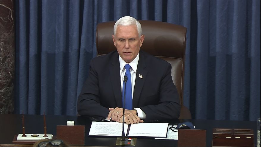 In this image from video, Vice President Mike Pence speaks as the Senate reconvenes after protesters stormed into the U.S. Capitol on Wednesday, Jan. 6, 2021. (Senate Television via AP)