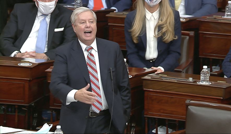 In this image from video, Sen. Lindsey Graham, R-S.C., speaks as the Senate reconvenes to debate the objection to confirm the Electoral College Vote from Arizona, after protesters stormed into the U.S. Capitol on Wednesday, Jan. 6, 2021. (Senate Television via AP)