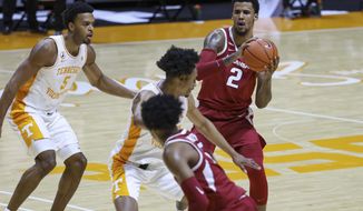 Arkansas forward Vance Jackson (2) looks to pass the ball against Tennessee during an NCAA college basketball game Wednesday, Jan. 6, 2021, in Knoxville, Tenn. (Randy Sartin/USA TODAY Sports via AP, Pool)