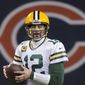 Green Bay Packers&#39; Aaron Rodgers looks to pass during the second half of an NFL football game against the Chicago Bears Sunday, Jan. 3, 2021, in Chicago. (AP Photo/Nam Y. Huh)