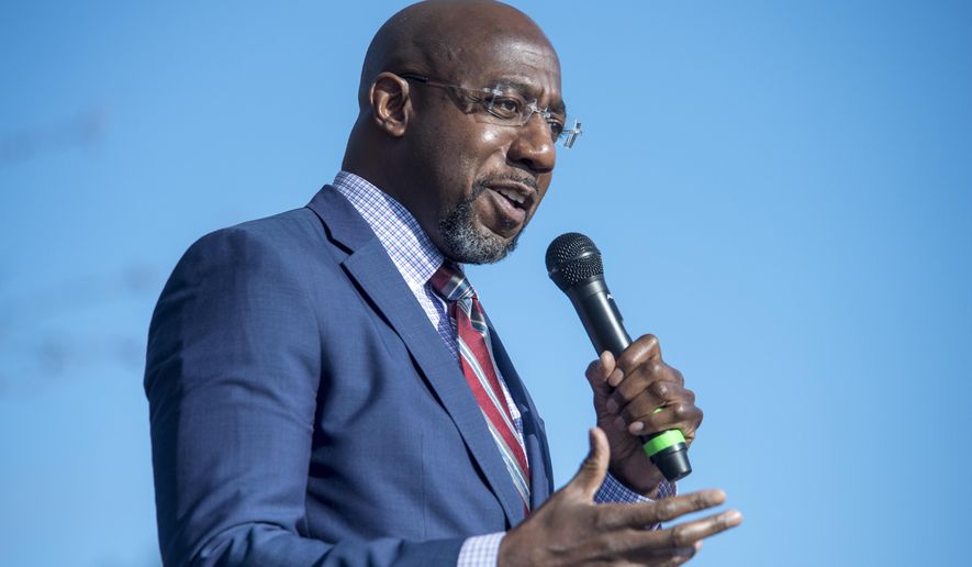 Georgia Democratic senate candidate Raphael Warnock speaks during a campaign rally in Augusta, Ga., Monday, Jan. 4, 2021. Democrats Jon Ossoff and Warnock are challenging incumbent Republican Senators David Perdue and Kelly Loeffler in a runoff election on Jan. 5. (Michael Holahan/The Augusta Chronicle via AP)