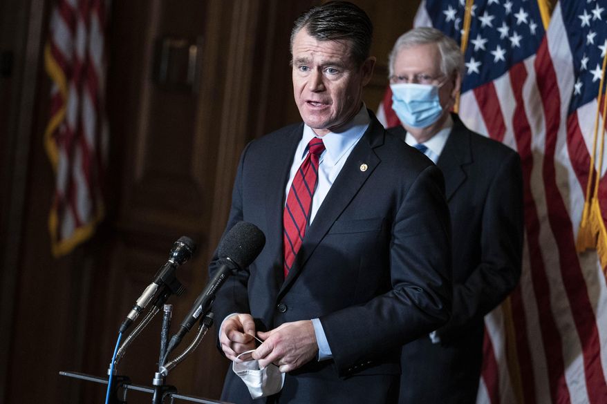 Sen. Todd Young, R-Ind., speaks during a news conference following a weekly meeting with the Senate Republican caucus, Tuesday, Dec. 8. 2020 at the Capitol in Washington. (Sarah Silbiger/Pool via AP)
