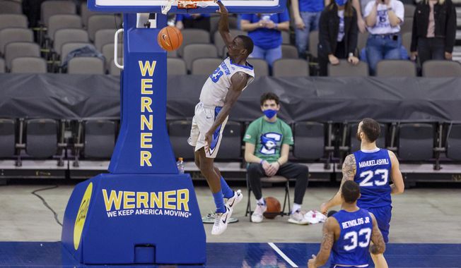 Creighton forward Damien Jefferson (23) dunks during the first half against Seton Hall in an NCAA college basketball game Wednesday, Jan. 6, 2021, in Omaha, Neb. (AP Photo/John Peterson)