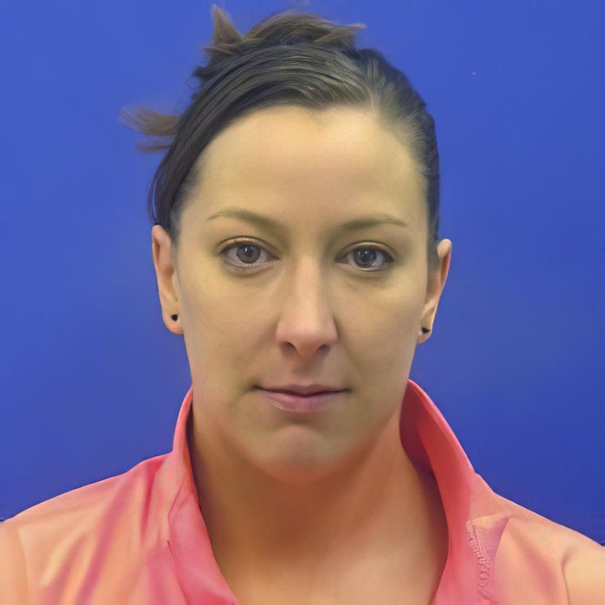 This driver&#39;s license photo from the Maryland Motor Vehicle Administration (MVA), provided to AP by the Calvert County Sheriff’s Office, shows Ashli Babbitt. Babbitt was fatally shot by an employee of the Capitol Police inside the U.S. Capitol building in Washington on Wednesday, Jan. 6, 2021, while the rioters were moving toward the House chamber. (Maryland MVA/Courtesy of the Calvert County Sheriff’s Office via AP) ** FILE **