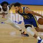 Golden State Warriors guard Stephen Curry, right, drives against Los Angeles Clippers guard Patrick Beverley during the first half of an NBA basketball game in San Francisco, Wednesday, Jan. 6, 2021. (AP Photo/Jeff Chiu)