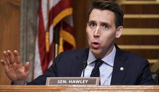 Sen. Josh Hawley, R-Mo., asks questions during a Senate Homeland Security &amp;amp; Governmental Affairs Committee hearing to discuss election security and the 2020 election process on Wednesday, Dec. 16, 2020, on Capitol Hill in Washington. (Greg Nash/Pool via AP)