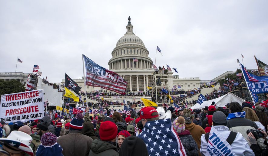 Supporters of President Donald Trump rally at the U.S. Capitol on Wednesday, Jan. 6, 2021, in Washington. (AP Photo/Jose Luis Magana)