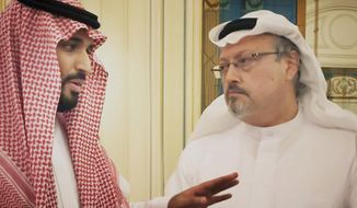 This image released by Briarcliff Entertainment shows Saudi Crown Prince Mohammed bin Salman, left, with journalist Jamal Khashoggi in a scene from the documentary &amp;quot;The Dissident.&amp;quot;  (Briarcliff Entertainment via AP)