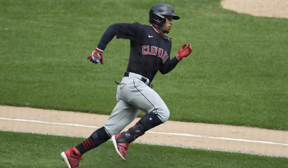 FILE - Cleveland Indians&#x27; Francisco Lindor runs after hitting a double against the Chicago White Sox during the fourth inning of a baseball game in Chicago, in this Saturday, Aug. 8, 2020, file photo. The Cleveland Indians have agreed to trade four-time All-Star shortstop Francisco Lindor and pitcher Carlos Carrasco to the New York Mets, a person with direct knowledge of the deal told the Associated Press on Thursday, Jan. 7, 2021.(AP Photo/Nam Y. Huh, File)