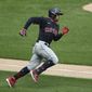 FILE - Cleveland Indians&#39; Francisco Lindor runs after hitting a double against the Chicago White Sox during the fourth inning of a baseball game in Chicago, in this Saturday, Aug. 8, 2020, file photo. The Cleveland Indians have agreed to trade four-time All-Star shortstop Francisco Lindor and pitcher Carlos Carrasco to the New York Mets, a person with direct knowledge of the deal told the Associated Press on Thursday, Jan. 7, 2021.(AP Photo/Nam Y. Huh, File)