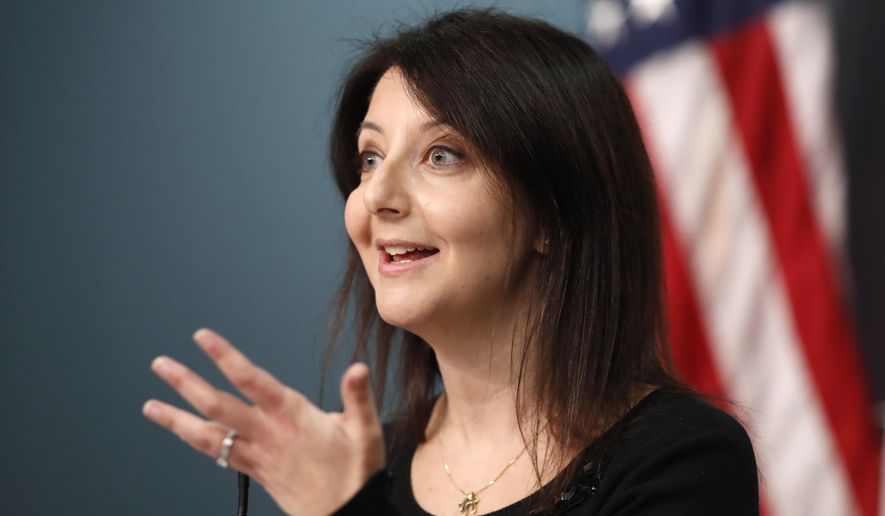 Dr. Mandy Cohen, Secretary of the N.C. Department of Health and Human Services, answers a question during a briefing at the Emergency Operations Center in Raleigh, N.C., Wednesday, Jan. 6, 2021. (Ethan Hyman/The News & Observer via AP)
