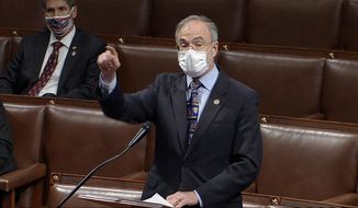 In this image from video, Rep. Andy Harris, R-Md., speaks as the House debates the objection to confirm the Electoral College vote from Pennsylvania, at the U.S. Capitol early Thursday, Jan. 7, 2021. (House Television via AP)