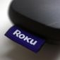 This Aug. 13, 2020 file photo shows a logo for Roku on a remote control in Portland, Ore. (AP Photo/Jenny Kane, File)