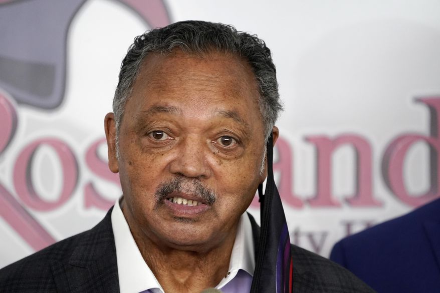 Rev. Jesse Jackson speaks Friday, Jan. 8, 2021, before receiving the Pfizer&#39;s BioNTech COVID-19 vaccine at the Roseland Community Hospital in Chicago. (AP Photo/Charles Rex Arbogast)