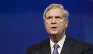 FILE - In this Dec. 11, 2020, file photo former Agriculture Secretary Tom Vilsack, who the Biden administration chose to reprise that role, speaks during an event at The Queen theater in Wilmington, Del. (AP Photo/Susan Walsh, File)