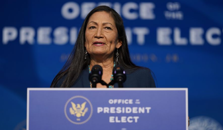 FILE - In this Dec. 20, 2020, file photo the Biden administration's nominee for Secretary of Interior, Rep. Deb Haaland, D-N.M., speaks at The Queen Theater in Wilmington Del. (AP Photo/Carolyn Kaster, File)