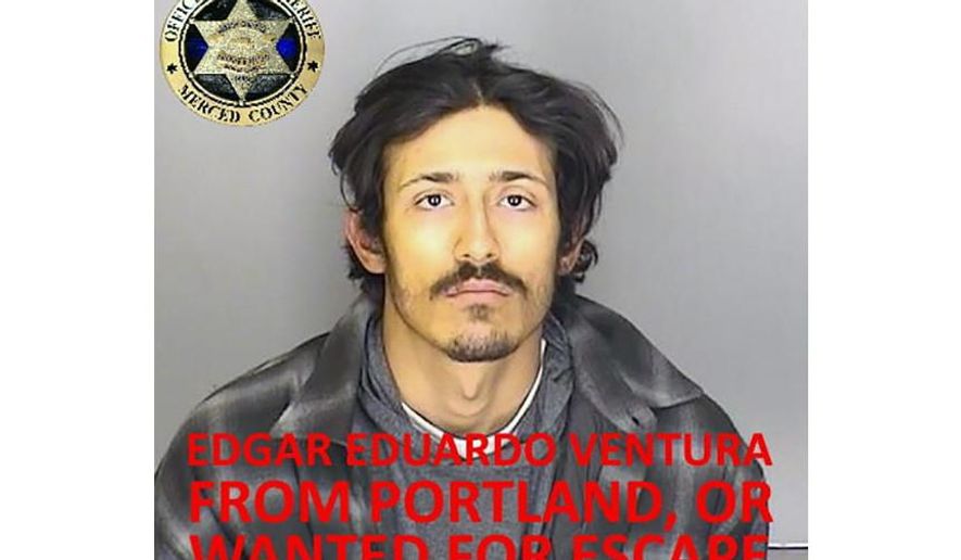 This undated booking photo released by the Merced County Sheriff&#39;s Office shows escapee inmate Edgar Eduardo Ventura, from Portland, Ore. Authorities in central California are searching for six inmates, including Ventura, who used a &amp;quot;homemade rope&amp;quot; to escape from a county jail. The Merced County Sheriff&#39;s Office says all six should be considered armed and dangerous. Staff at Merced County Downtown Jail noticed late Saturday, Jan.10, 2021, that the six inmates were missing. (Merced County Sheriff&#39;s Office via AP)