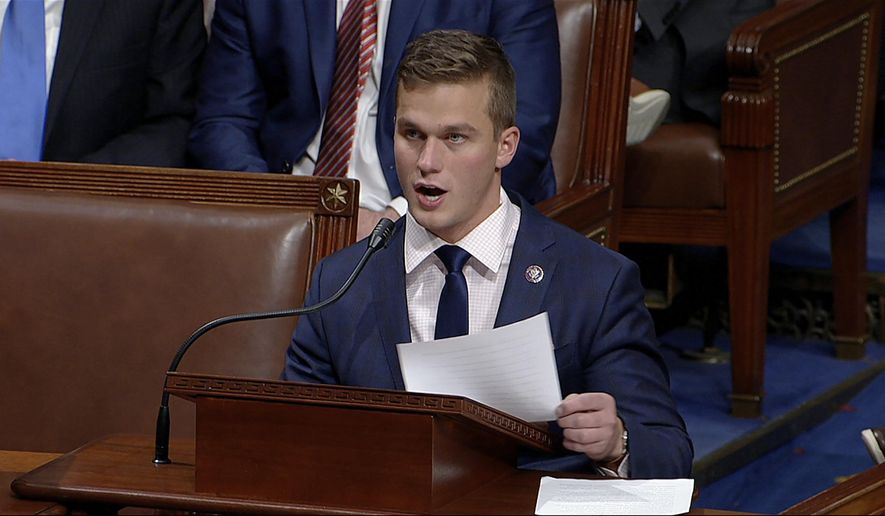 In this image from video, Rep. Madison Cawthorn, R-N.C., speaks as the House debates the objection to confirm the Electoral College vote from Pennsylvania, at the U.S. Capitol early Thursday, Jan. 7, 2021. (House Television via AP)