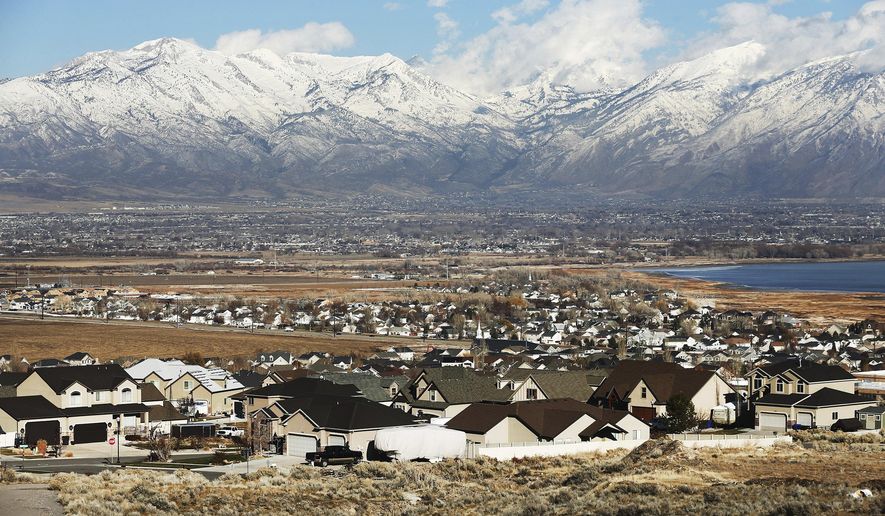 Home construction in Saratoga Springs, Utah is seen on Monday, Dec. 12, 2016. For the third year in a row, Utah County surpassed Salt Lake County in population growth, making it the new epicenter of population growth in the Beehive State.. (Scott G Winterton/The Deseret News via AP)