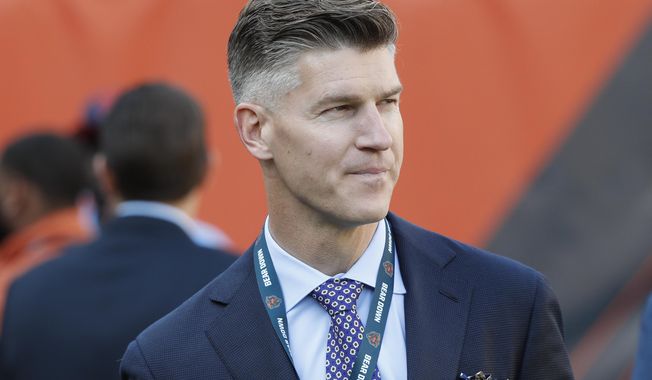 FILE - Chicago Bears general manager Ryan Pace walks the field before an NFL football game against the Green Bay Packers in Chicago, in this Thursday, Sept. 5, 2019, file photo. The Bears head into the offseason with some big issues to address after going 8-8 for the second year in a row, starting with whether general manager Ryan Pace or coach Matt Nagy will be retained. (AP Photo/Charles Rex Arbogast, File)