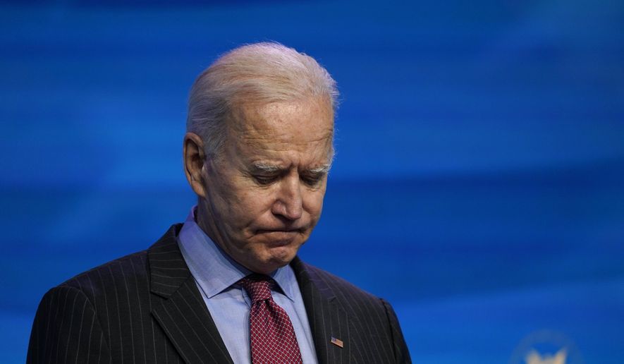 In this Jan. 8, 2021, file photo President-elect Joe Biden speaks during an event at The Queen theater in Wilmington, Del. When Biden takes office later this month, his biggest challenge may be navigating a deeply divided country past the turmoil of the Trump era. (AP Photo/Susan Walsh, File)