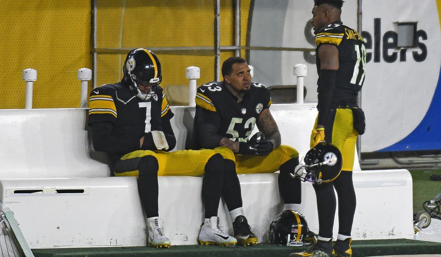 Pittsburgh Steelers quarterback Ben Roethlisberger (7) and center Maurkice Pouncey (53) sit on the bench as they talk with wide receiver JuJu Smith-Schuster (19) following a 48-37 loss to the Cleveland Browns in an NFL wild-card playoff football game in Pittsburgh, late Sunday, Jan. 10, 2021. (AP Photo/Don Wright)