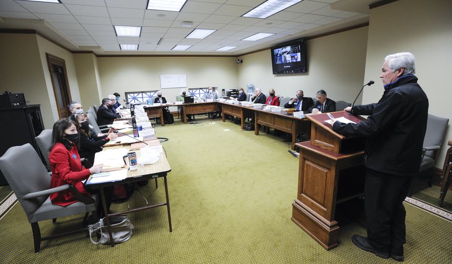 The House State Administration Committee hears testimony on HB 122, a bill seeking to revise the state&#39;s disaster and emergency services and executive power, Tuesday, Jan. 12, 2021, at the State Capitol in Helena, Mont. (Thom Bridge/Independent Record via AP)