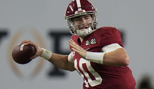 Alabama quarterback Mac Jones passes against Ohio State during the second half of an NCAA College Football Playoff national championship game, Monday, Jan. 11, 2021, in Miami Gardens, Fla. (AP Photo/Chris O&#x27;Meara)