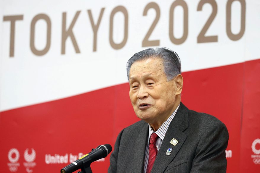 Tokyo 2020 Organizing Committee President Yoshiro Mori delivers a New Year's address in Tokyo Tuesday, Jan. 12, 2021. Mori tried on Tuesday to reassure the public that the postponed games will open in just over six months. (Kyodo News via AP)