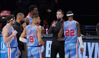 Brooklyn Nets head coach Steve Nash talks to Nets&#x27; Joe Harris (12), Jeff Green, Timothe Luwawu-Cabarrot (9) and Caris LeVert (22) during the second half of an NBA basketball game against the Oklahoma City Thunder, Sunday, Jan. 10, 2021, in New York. The Thunder defeated the Nets 129-116. (AP Photo/Kathy Willens) **FILE**