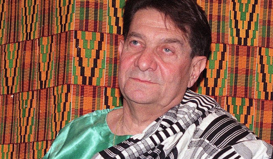 FILE - In this Friday, Jan. 22, 1999, file photo, attorney Fred Levin waits to be honored by the Ambassador of Ghana to the United States, at the United Nations. Levin, the Florida attorney who won a major legal battle against the tobacco industry in the 1990s, died Tuesday, Jan. 12, 2021, days after contracting the coronavirus. He was 83. (AP Photo/Ed Bailey, File)