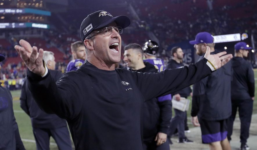 FILE - Baltimore Ravens head coach John Harbaugh celebrates after beating the Los Angeles Rams in an NFL football game  in Los Angeles, in this Nov. 25, 2019, file photo. Home-field advantage in the playoffs is overrated for Ravens coach John Harbaugh, who has found that the road to success in the postseason usually involves packing his bags and getting the heck out of Baltimore. Last week&#39;s 20-13 victory in Tennessee was Harbaugh&#39;s eighth on the road in the playoffs, the most by any coach in NFL history, breaking a tie with Tom Landry and Tom Coughlin. (AP Photo/Marcio Jose Sanchez, FIle)
