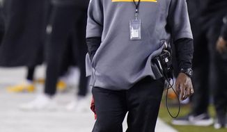 Pittsburgh Steelers head coach Mike Tomlin watches the second half of an NFL football game against the Cincinnati Bengals, Monday, Dec. 21, 2020, in Cincinnati. (AP Photo/Bryan Woolston)