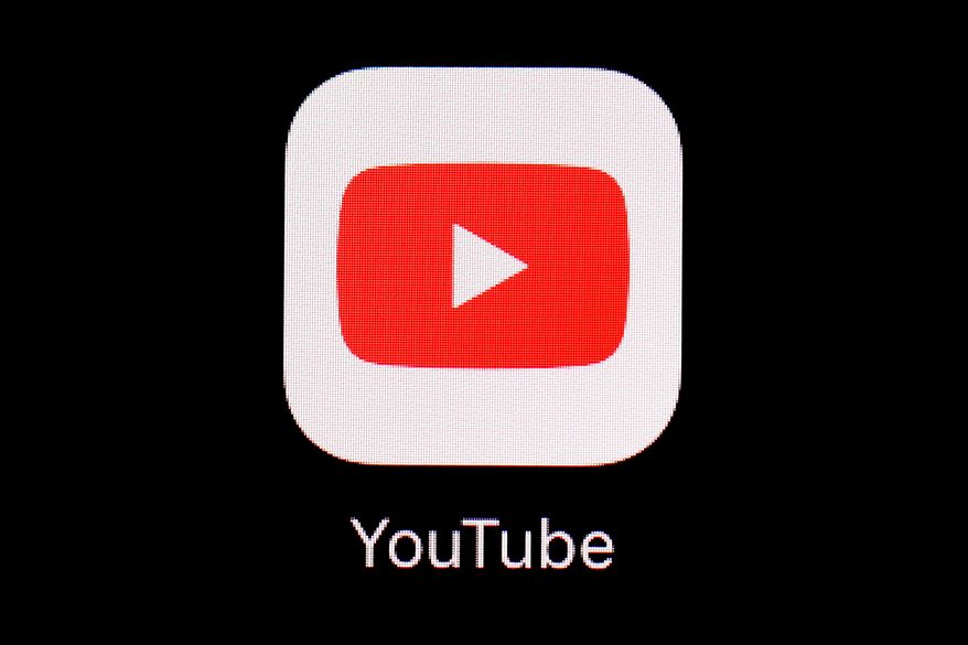 This March 20, 2018, file photo shows the YouTube app on an iPad in Baltimore. (AP Photo/Patrick Semansky, File) **FILE**