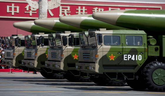 China’s DF-26 ballistic missiles worry the U.S. because they can be fired from long ranges with enough precision to attack a moving ship. (Associated Press)