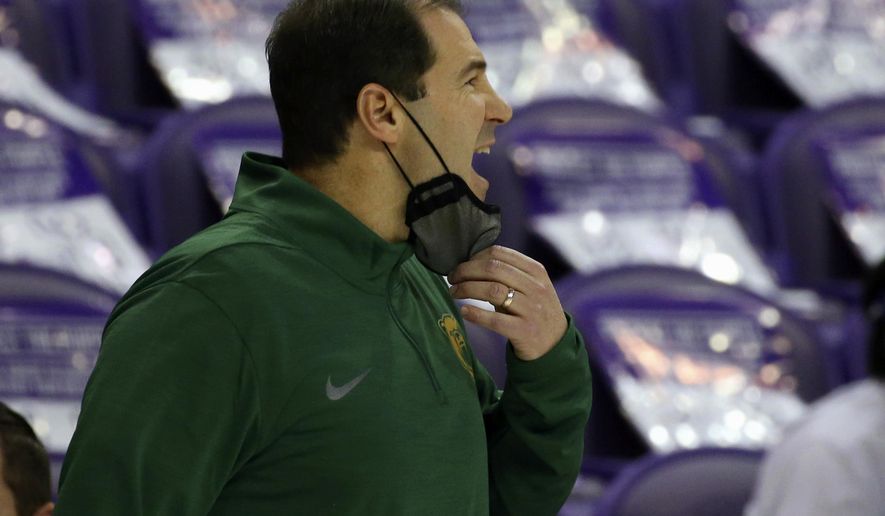 Baylor head coach Scott Drew reacts during an NCAA college basketball game against TCU, Saturday, Jan. 9, 2021, in Fort Worth, Texas. (AP Photo/ Richard W. Rodriguez)
