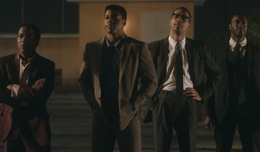 This image released by Amazon Studios shows Leslie Odom Jr., from left, Eli Goree, Kingsley Ben-Adir and Aldis Hodge in a scene from &amp;quot;One Night in Miami.&amp;quot; (Amazon Studios via AP)